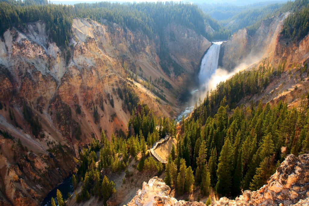 This article describes the top 5 places to visit in Yellowstone National Park and things to do at each place. The Lower Falls in Yellowstone's Grand Canyon.
