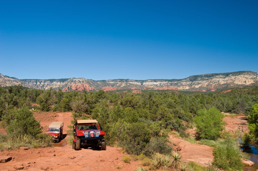 Two Jeeps doing an off-road tour on one of the easier roads.