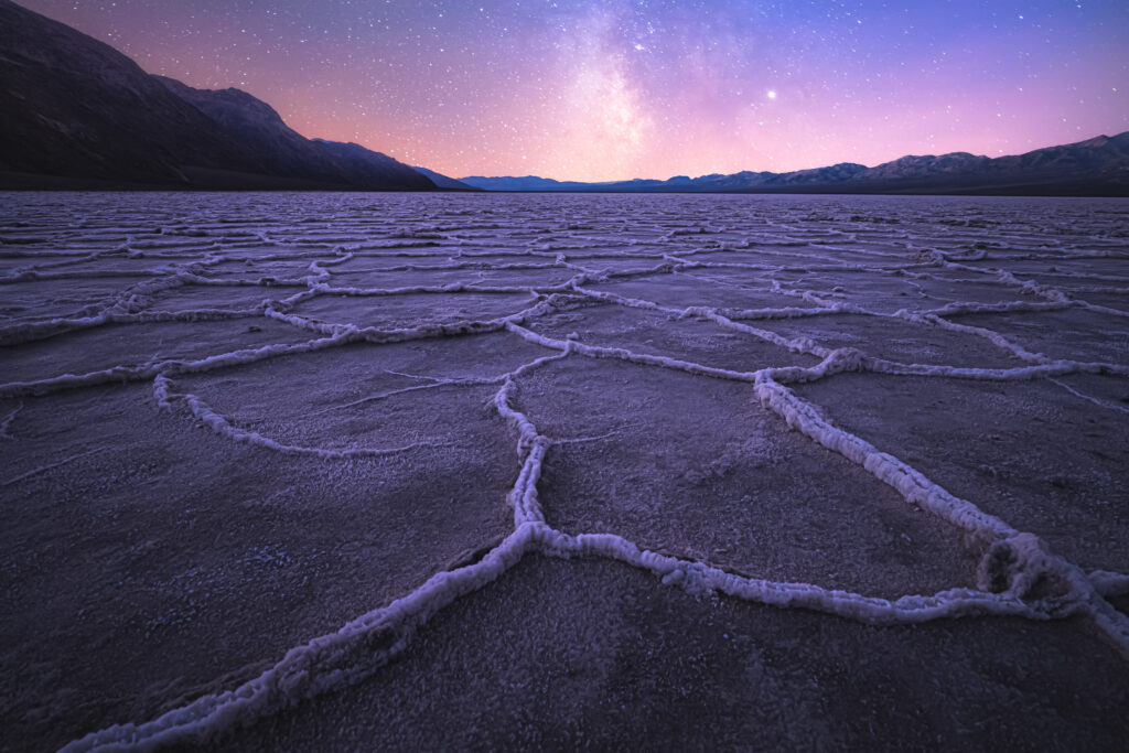 The salt flats at Badwater Basin under the Milky Way in Death Valley National Park.