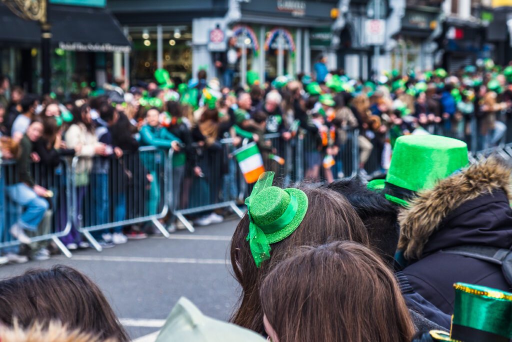 Crowds lining the street for the Saint Patrick's day parade.