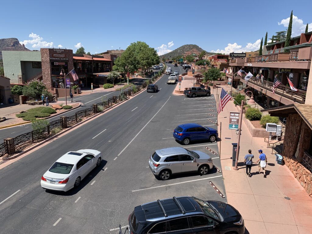 Looking south down Sedona's main tourist area. This section of Route 89A is lined with souvenir shops, restaurants and various other stores, hotels, and tour operators.